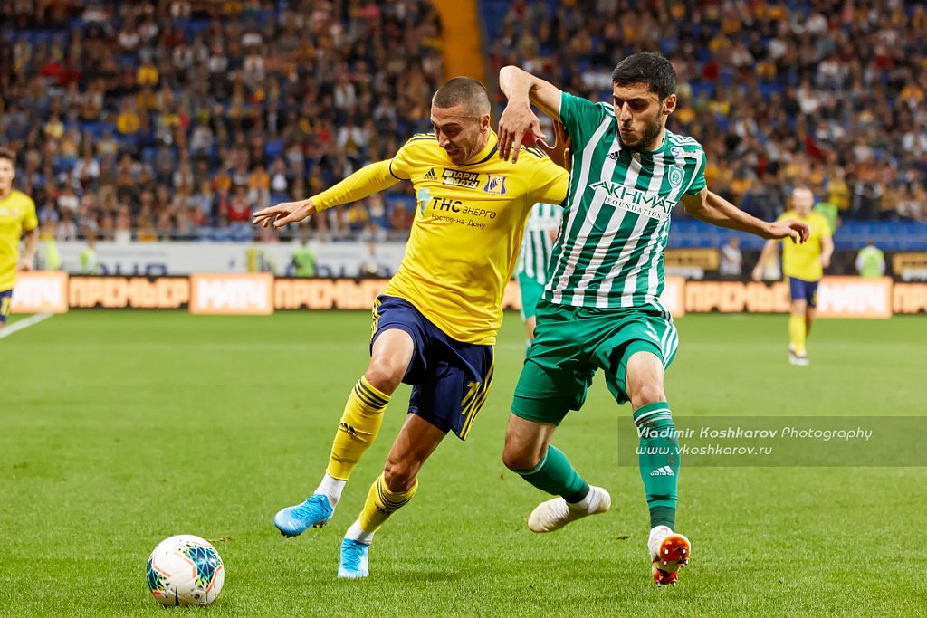 Aleksey Ionov of FC Rostov battle for the ball Magomed Musalov o